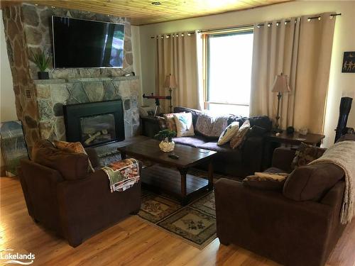 505 Second Avenue N, Sauble Beach, ON - Indoor Photo Showing Living Room With Fireplace