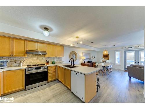 2C-194 River Road E, Wasaga Beach, ON - Indoor Photo Showing Kitchen With Double Sink