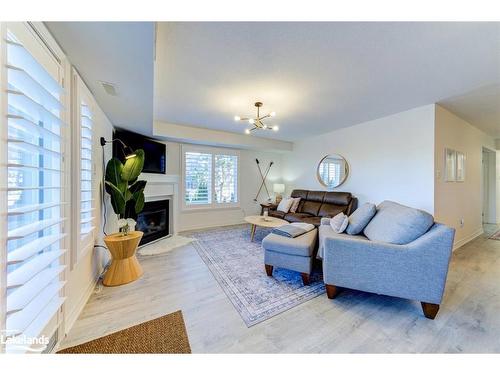 2C-194 River Road E, Wasaga Beach, ON - Indoor Photo Showing Living Room With Fireplace