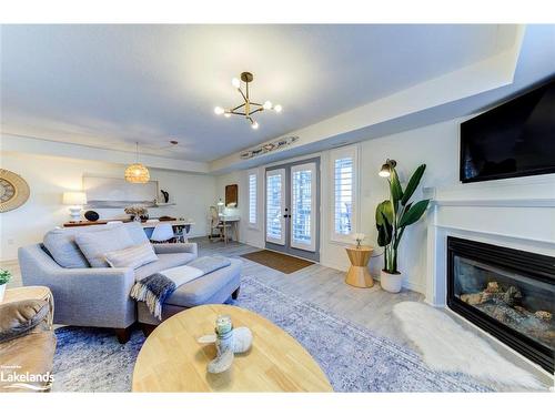 2C-194 River Road E, Wasaga Beach, ON - Indoor Photo Showing Living Room With Fireplace