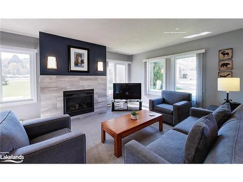 107-169 Jozo Weider Boulevard, The Blue Mountains, ON - Indoor Photo Showing Living Room With Fireplace