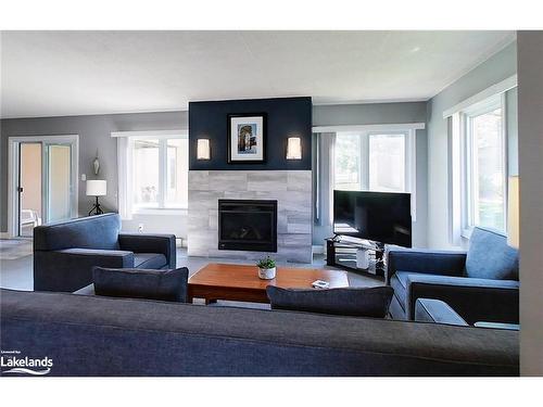 107-169 Jozo Weider Boulevard, The Blue Mountains, ON - Indoor Photo Showing Living Room With Fireplace