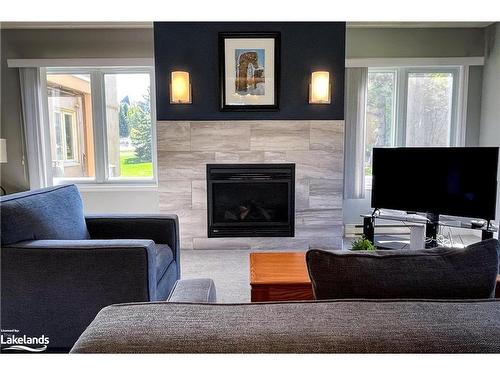 107-169 Jozo Weider Boulevard, The Blue Mountains, ON - Indoor Photo Showing Living Room With Fireplace