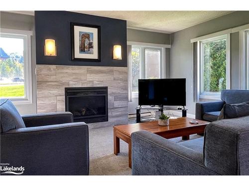 107-169 Jozo Weider Boulevard, The Blue Mountains, ON - Indoor Photo Showing Living Room With Fireplace