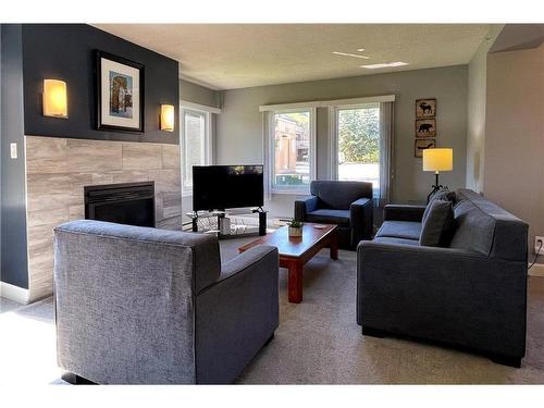 107-169 Jozo Weider Boulevard, The Blue Mountains, ON - Indoor Photo Showing Living Room With Fireplace