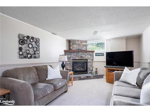 10 Leslie Drive, Collingwood, ON - Indoor Photo Showing Living Room With Fireplace