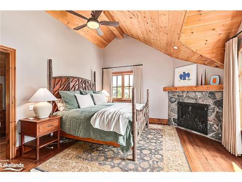 146 Wyandot Court, The Blue Mountains, ON - Indoor Photo Showing Bedroom With Fireplace