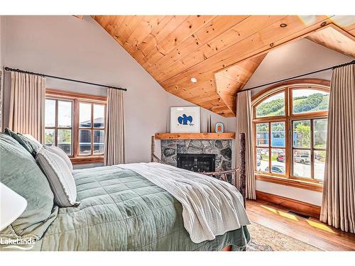 146 Wyandot Court, The Blue Mountains, ON - Indoor Photo Showing Bedroom With Fireplace