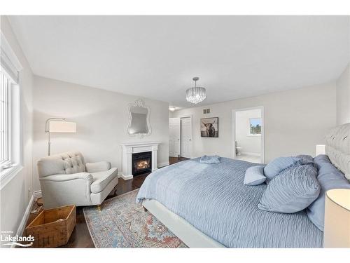 3 Brechin Crescent, Oro-Medonte, ON - Indoor Photo Showing Bedroom With Fireplace