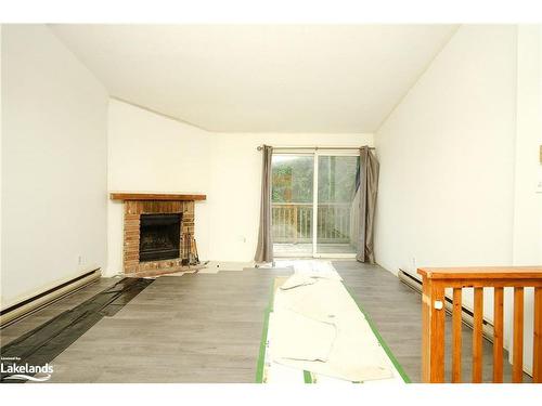 180 Escarpment Crescent, Collingwood, ON - Indoor Photo Showing Living Room With Fireplace