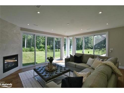 4 Laurel Boulevard, Collingwood, ON - Indoor Photo Showing Living Room With Fireplace