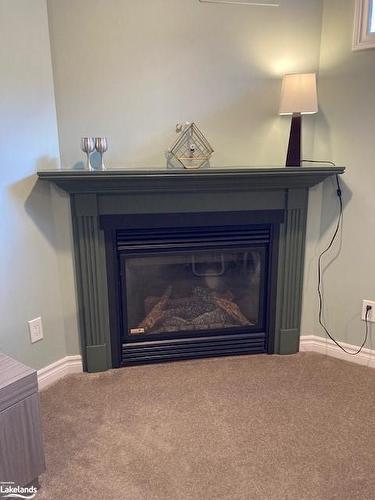 553 1St Street Sw, Owen Sound, ON - Indoor Photo Showing Living Room With Fireplace