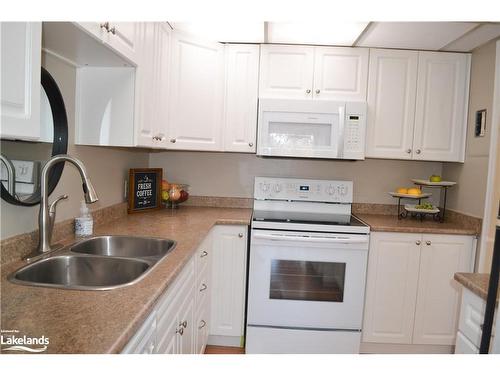 22-26 Herman Avenue, Huntsville, ON - Indoor Photo Showing Kitchen With Double Sink