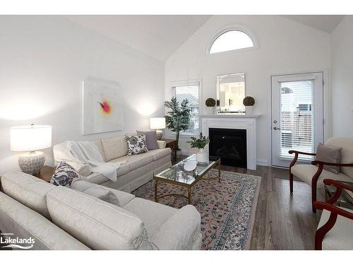 4 Sutton Lane, Collingwood, ON - Indoor Photo Showing Living Room With Fireplace