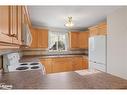 55 Breithaupt Crescent, Tiny, ON  - Indoor Photo Showing Kitchen With Double Sink 