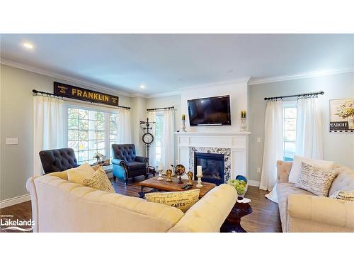 393 Tiny Beaches Road S, Tiny, ON - Indoor Photo Showing Living Room With Fireplace