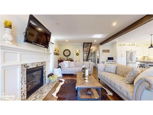 393 Tiny Beaches Road S, Tiny, ON - Indoor Photo Showing Living Room With Fireplace