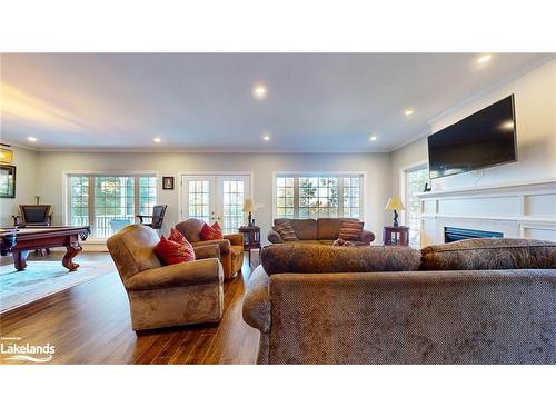 393 Tiny Beaches Road S, Tiny, ON - Indoor Photo Showing Living Room With Fireplace