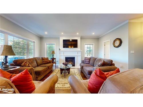 393 Tiny Beaches Road S, Tiny, ON - Indoor Photo Showing Living Room With Fireplace