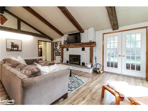 449 Mertz Corner Rd, Tiny, ON - Indoor Photo Showing Living Room With Fireplace