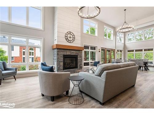 202-200 Anglo Street, Bracebridge, ON - Indoor Photo Showing Living Room With Fireplace