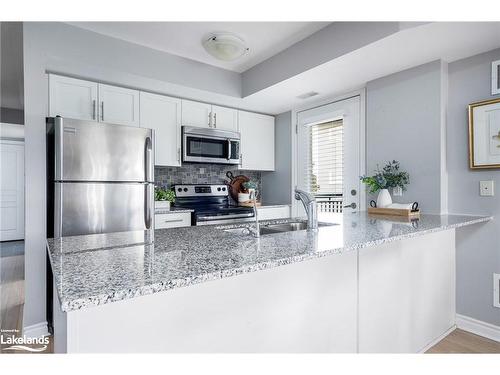 201-10 Brandy Lane Drive, Collingwood, ON - Indoor Photo Showing Kitchen With Stainless Steel Kitchen With Upgraded Kitchen