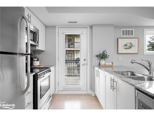 201-10 Brandy Lane Drive, Collingwood, ON - Indoor Photo Showing Kitchen With Stainless Steel Kitchen With Double Sink