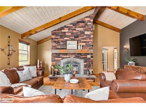 47 Blackburn Avenue, Nottawa, ON - Indoor Photo Showing Living Room With Fireplace