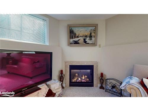 26 Fairway Crescent, Wasaga Beach, ON - Indoor Photo Showing Living Room With Fireplace