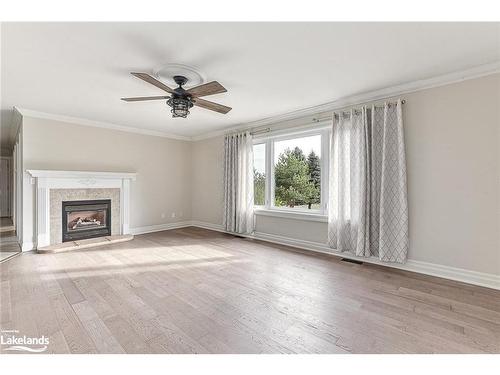 4228 Hogback Road, Glencairn, ON - Indoor Photo Showing Living Room With Fireplace