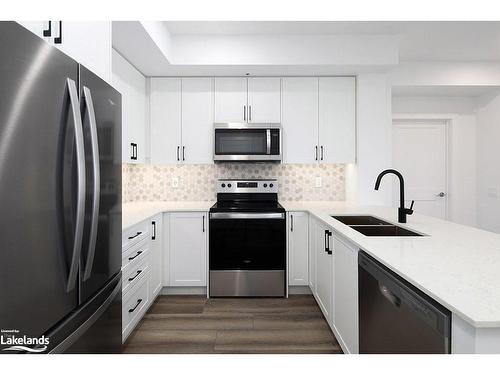 318-4 Kimberly Lane, Collingwood, ON - Indoor Photo Showing Kitchen With Double Sink With Upgraded Kitchen