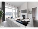 183 West Ridge Drive, Thornbury, ON  - Indoor Photo Showing Living Room With Fireplace 