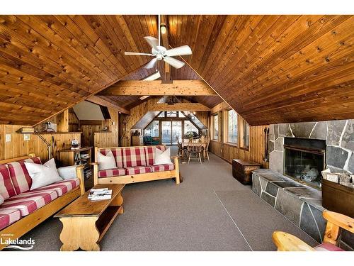 4-242 Arrowhead Road, The Blue Mountains, ON - Indoor Photo Showing Living Room With Fireplace