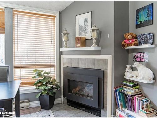 1012 Parasol Drive, Algonquin Highlands, ON - Indoor Photo Showing Living Room With Fireplace