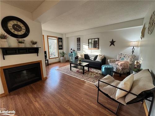 20 Liza Crescent, Bracebridge, ON - Indoor Photo Showing Living Room With Fireplace