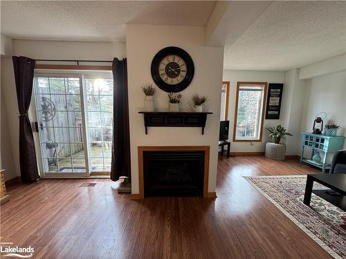 20 Liza Crescent, Bracebridge, ON - Indoor Photo Showing Living Room With Fireplace