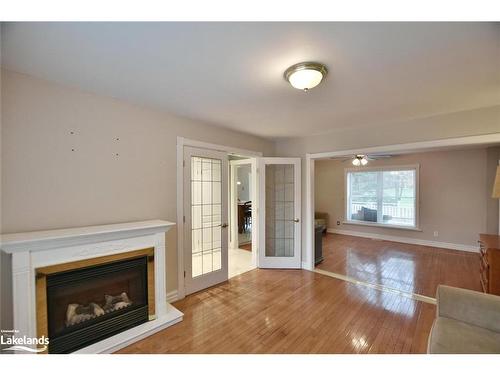 46 Fairway Crescent, Wasaga Beach, ON - Indoor Photo Showing Living Room With Fireplace