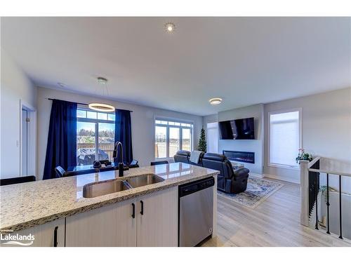 1 Bianca Crescent, Wasaga Beach, ON - Indoor Photo Showing Kitchen With Fireplace With Double Sink