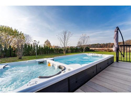 54 Asselin Drive, Tiny, ON - Outdoor With Above Ground Pool With Backyard