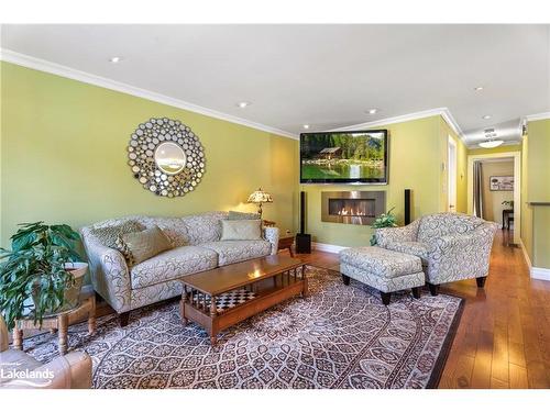 20 Colwill Drive, Elliot Lake, ON - Indoor Photo Showing Living Room With Fireplace