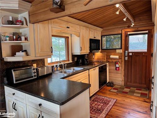 71 Earls Road, Mactier, ON - Indoor Photo Showing Kitchen With Double Sink