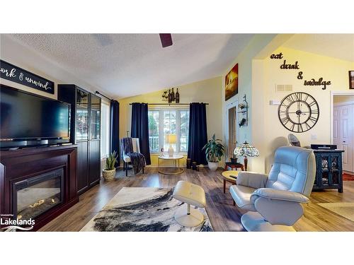 69 St James Place, Wasaga Beach, ON - Indoor Photo Showing Living Room With Fireplace