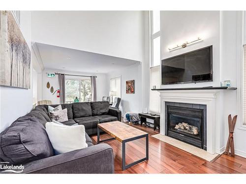 108-110 Fairway Court, The Blue Mountains, ON - Indoor Photo Showing Living Room With Fireplace