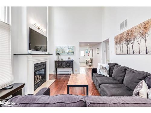 108-110 Fairway Court, The Blue Mountains, ON - Indoor Photo Showing Living Room With Fireplace