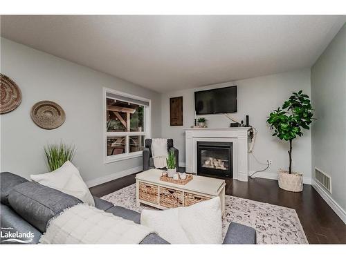 80 Fieldstream Chase, Bracebridge, ON - Indoor Photo Showing Living Room With Fireplace