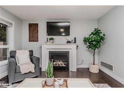 80 Fieldstream Chase, Bracebridge, ON - Indoor Photo Showing Living Room With Fireplace