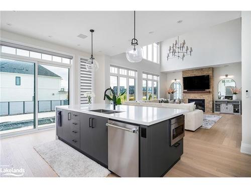 103 Springside Crescent, The Blue Mountains, ON - Indoor Photo Showing Kitchen With Fireplace With Double Sink With Upgraded Kitchen