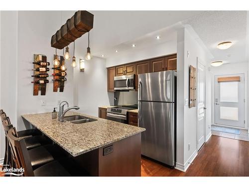 302-10 Brandy Lane Drive, Collingwood, ON - Indoor Photo Showing Kitchen With Double Sink