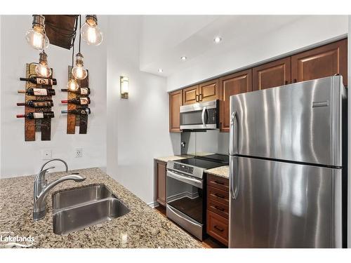 302-10 Brandy Lane Drive, Collingwood, ON - Indoor Photo Showing Kitchen With Double Sink