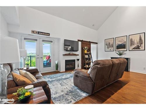 302-10 Brandy Lane Drive, Collingwood, ON - Indoor Photo Showing Living Room With Fireplace